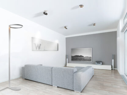 View of living-room interior with lounge